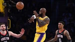 LEBRON JAMES DELIVERS HISTORIC TRIPLE-THREAT PERFORMANCE AS LAKERS STUN ROCKETS IN GAME 1 UPSET - 41-YEAR-OLD LEGEND MAKES PLAYOFF HISTORY!